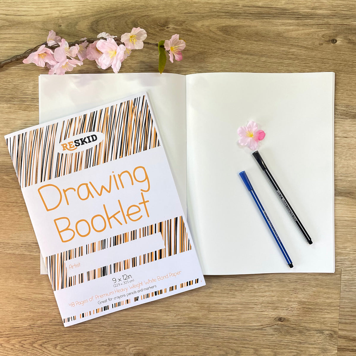 Reskid drawing booklet open with blank pages